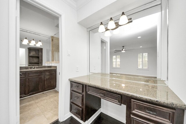 405 N Post Oak Ln Unit 405, Houston, TX 77024 - bathroom with vanity, a ceiling fan, and tile patterned floors