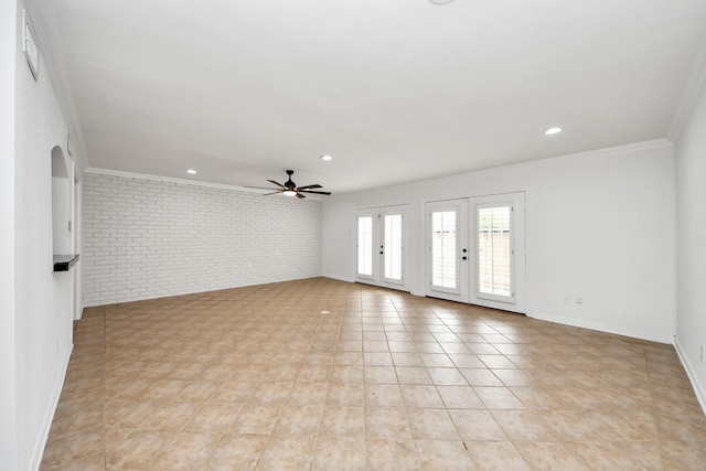 405 N Post Oak Ln Unit 405, Houston, TX 77024 - empty room featuring brick wall, ceiling fan, ornamental molding, recessed lighting, and baseboards