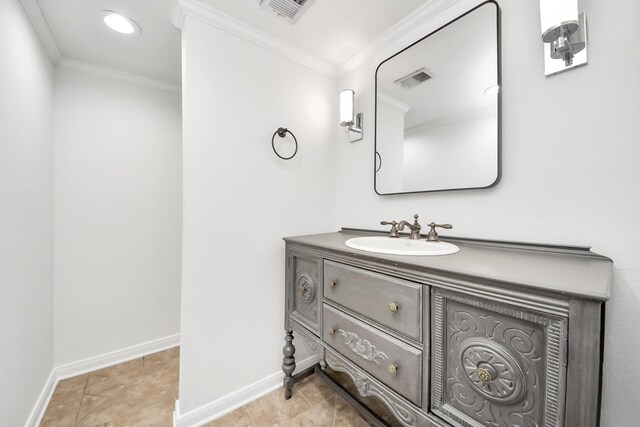 405 N Post Oak Ln Unit 405, Houston, TX 77024 - bathroom featuring ornamental molding, vanity, and baseboards