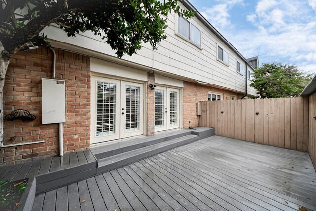 405 N Post Oak Ln Unit 405, Houston, TX 77024 - wooden deck with french doors