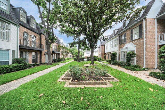 405 N Post Oak Ln Unit 405, Houston, TX 77024 - surrounding community featuring a residential view and a yard