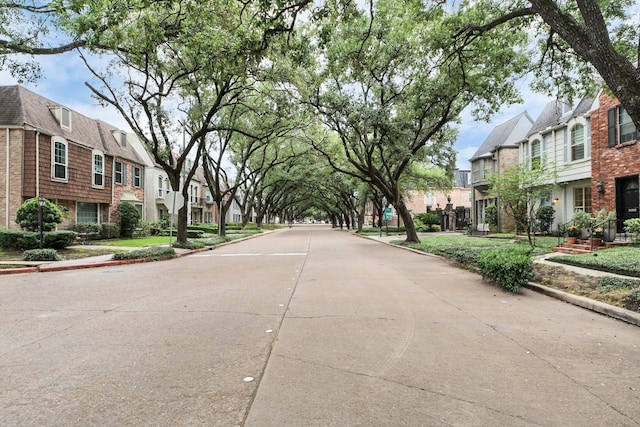 405 N Post Oak Ln Unit 405, Houston, TX 77024 - view of concrete road featuring a residential view, curbs, and sidewalks