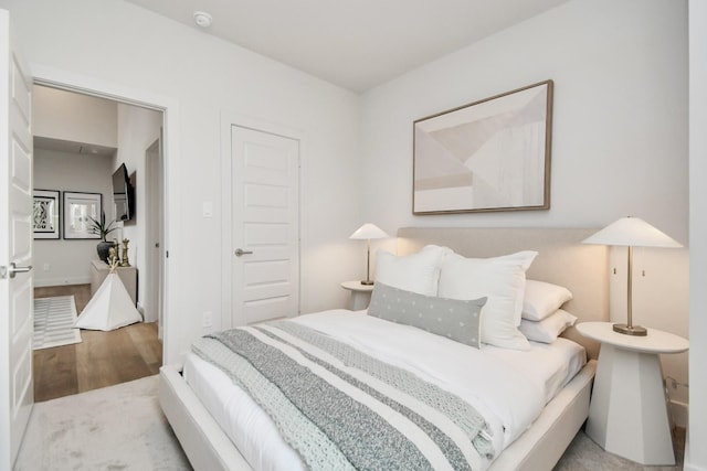 4020 Boho Ln, Houston, TX 77045 - bedroom with wood finished floors and baseboards