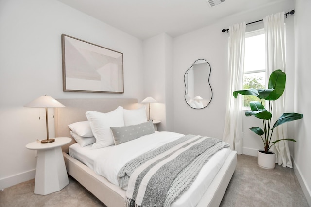 4020 Boho Ln, Houston, TX 77045 - bedroom with light carpet and baseboards