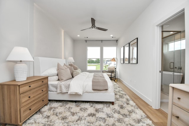 4020 Boho Ln, Houston, TX 77045 - bedroom with light wood-type flooring, baseboards, recessed lighting, and a ceiling fan