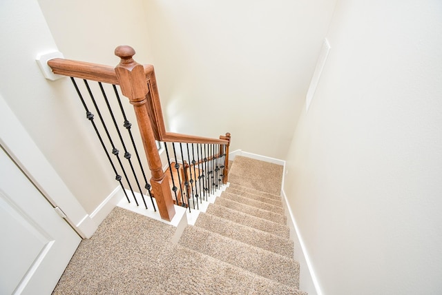 321 W 26th St Unit A, Houston, TX 77008 - stairway featuring baseboards and carpet floors