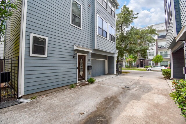 321 W 26th St Unit A, Houston, TX 77008 - view of home's exterior with a garage