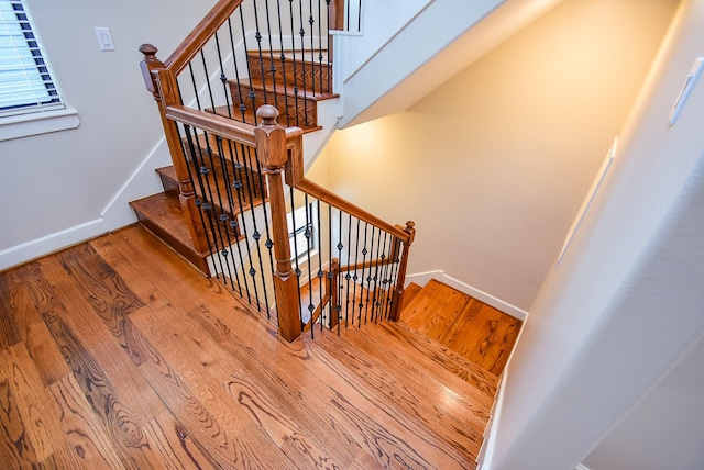 321 W 26th St Unit A, Houston, TX 77008 - staircase featuring wood finished floors and baseboards