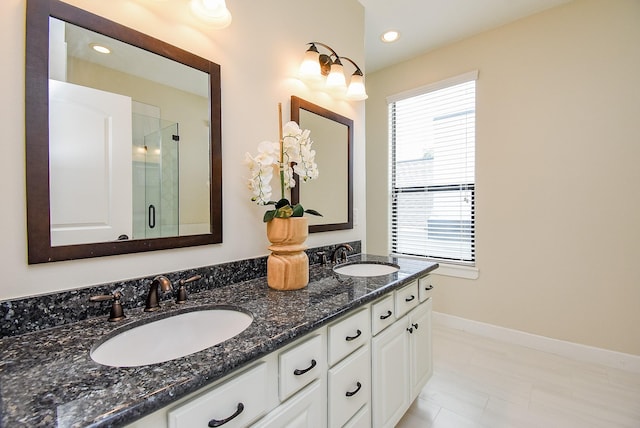 321 W 26th St Unit A, Houston, TX 77008 - full bath featuring double vanity, a shower stall, baseboards, and recessed lighting