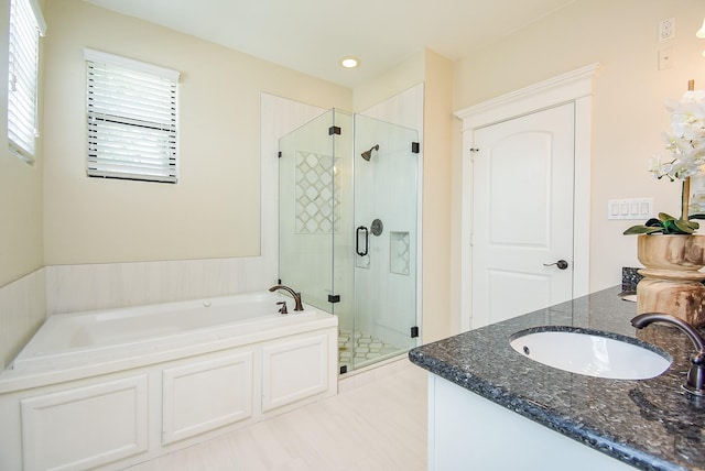 321 W 26th St Unit A, Houston, TX 77008 - bathroom with a garden tub, a stall shower, vanity, and recessed lighting