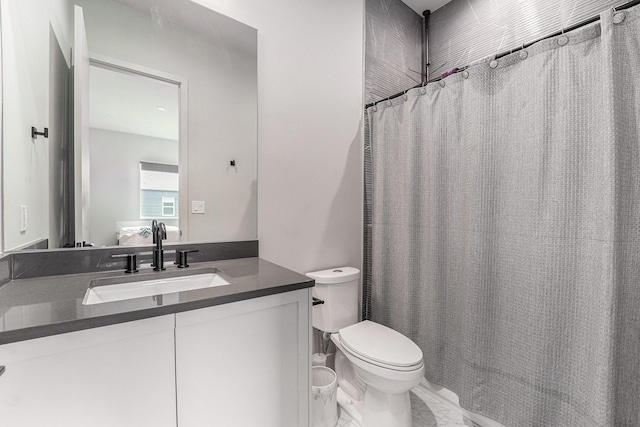 1116 Peden St, Houston, TX 77006 - bathroom featuring toilet, vanity, and marble finish flooring