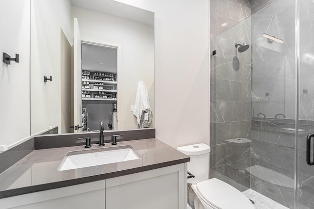 1116 Peden St, Houston, TX 77006 - bathroom featuring toilet, a stall shower, and vanity