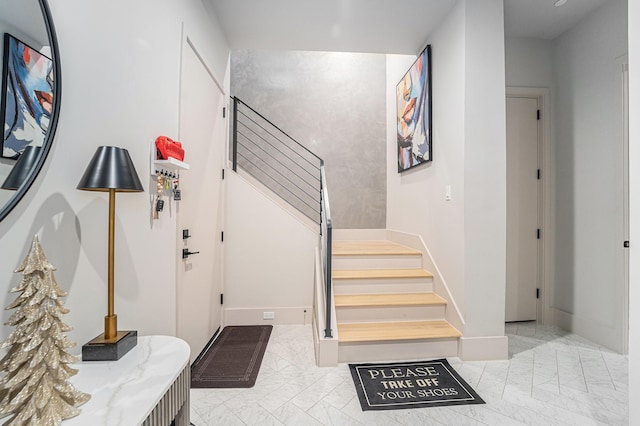1116 Peden St, Houston, TX 77006 - entrance foyer featuring stairway and light marble finish floors