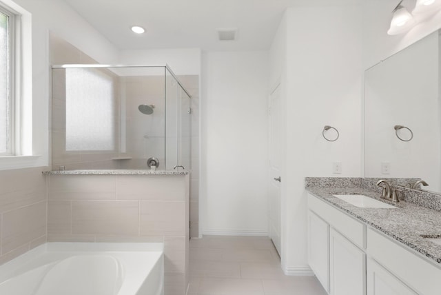 7919 Chantilly Mnr, Fulshear, TX 77441 - full bathroom featuring a tile shower, double vanity, a garden tub, and tile patterned flooring