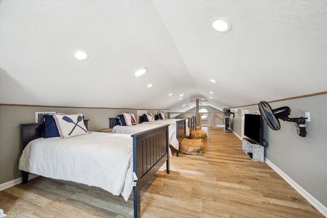 219 Bora Bora Dr, Tiki Island, TX 77554 - bedroom featuring lofted ceiling, light wood finished floors, baseboards, and recessed lighting
