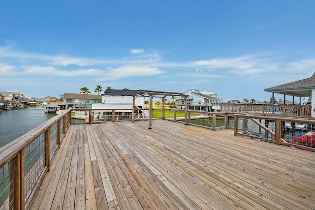 219 Bora Bora Dr, Tiki Island, TX 77554 - dock area with a deck with water view and a residential view