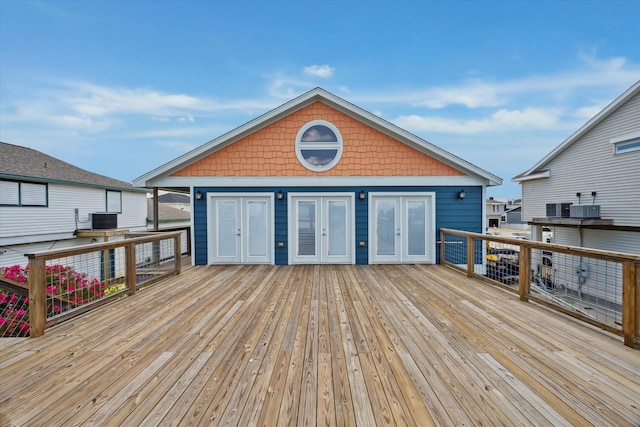 219 Bora Bora Dr, Tiki Island, TX 77554 - deck featuring french doors and central AC