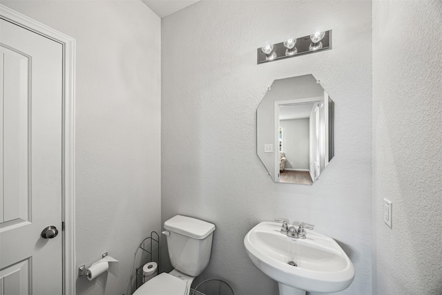 3919 Faletti Dr, Katy, TX 77493 - half bathroom with a sink and toilet