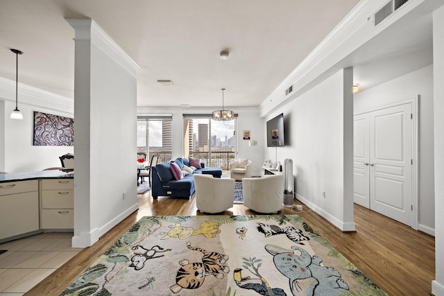 3333 Allen Pkwy Unit 908, Houston, TX 77019 - dining area with light wood-style floors, a chandelier, and baseboards