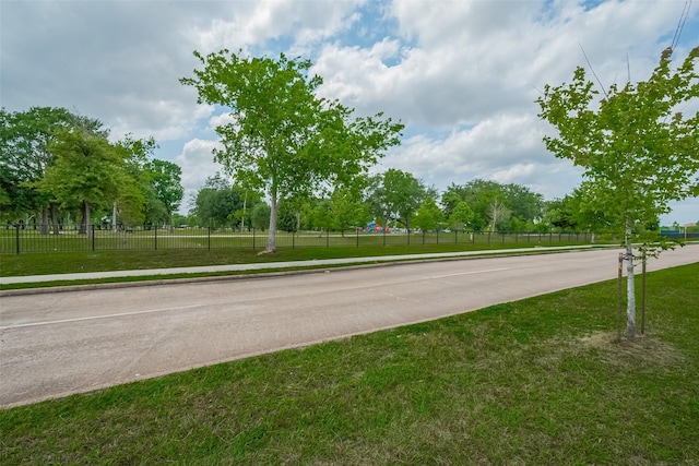 8621 Rustling Lvs Dr, Houston, TX 77083 - view of asphalt street featuring curbs