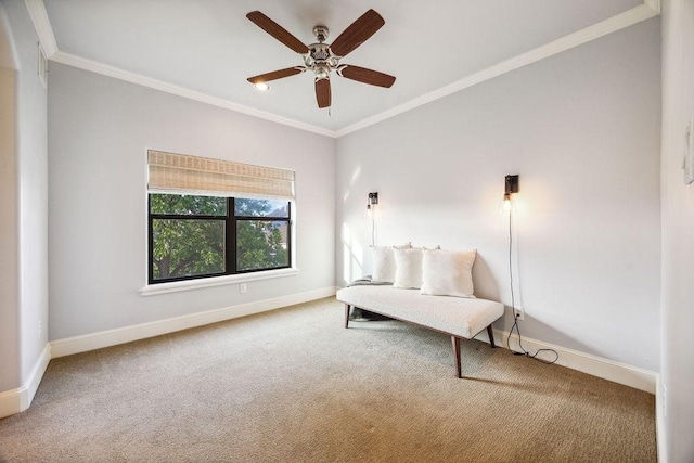 1604 Fowler St, Houston, TX 77007 - living area with crown molding, carpet, baseboards, and ceiling fan