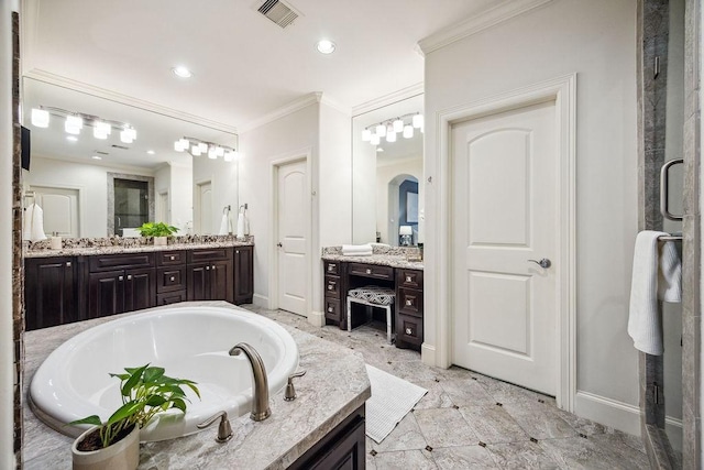 1604 Fowler St, Houston, TX 77007 - full bath featuring vanity, ornamental molding, a bath, a shower stall, and baseboards