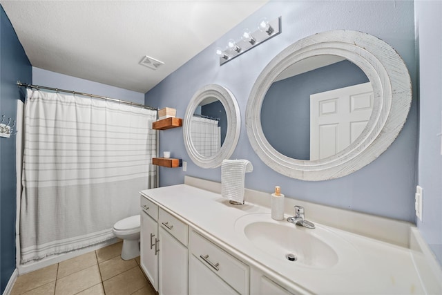 9822 Garnet Springs Dr, Iowa Colony, TX 77583 - full bath featuring vanity, toilet, tile patterned flooring, and a shower with curtain