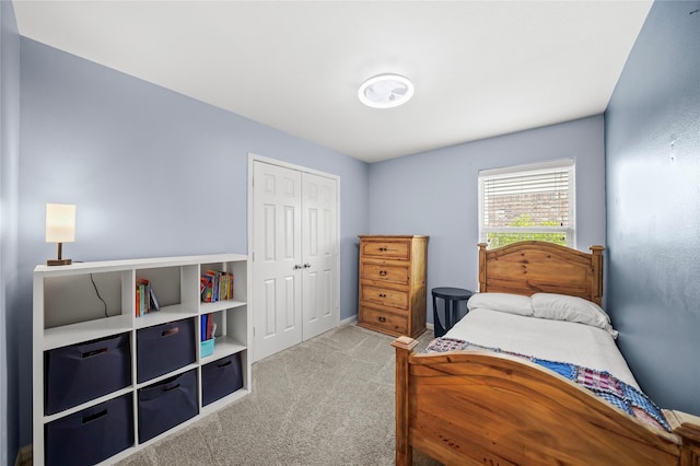 9822 Garnet Springs Dr, Iowa Colony, TX 77583 - carpeted bedroom with a closet and baseboards