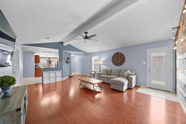 9822 Garnet Springs Dr, Iowa Colony, TX 77583 - living room featuring a ceiling fan, light wood finished floors, and baseboards