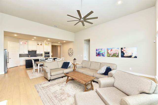 22911 Pearl Glen Dr, Richmond, TX 77469 - living room featuring a ceiling fan, light wood finished floors, and recessed lighting