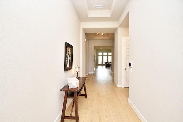 22911 Pearl Glen Dr, Richmond, TX 77469 - corridor featuring baseboards, light wood finished floors, and a raised ceiling