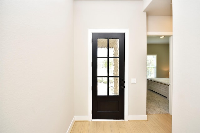 22911 Pearl Glen Dr, Richmond, TX 77469 - foyer with baseboards and light wood-type flooring