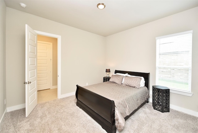 22911 Pearl Glen Dr, Richmond, TX 77469 - bedroom featuring light carpet and baseboards