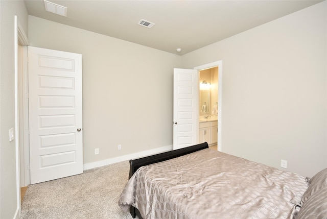22911 Pearl Glen Dr, Richmond, TX 77469 - carpeted bedroom with baseboards and ensuite bath