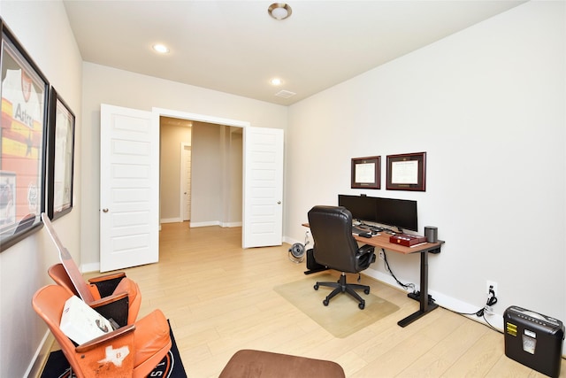 22911 Pearl Glen Dr, Richmond, TX 77469 - office space featuring wood finished floors, baseboards, and recessed lighting