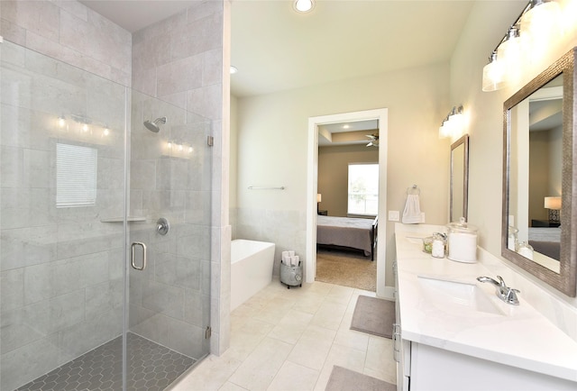 22911 Pearl Glen Dr, Richmond, TX 77469 - full bath with connected bathroom, a shower stall, vanity, a freestanding bath, and recessed lighting