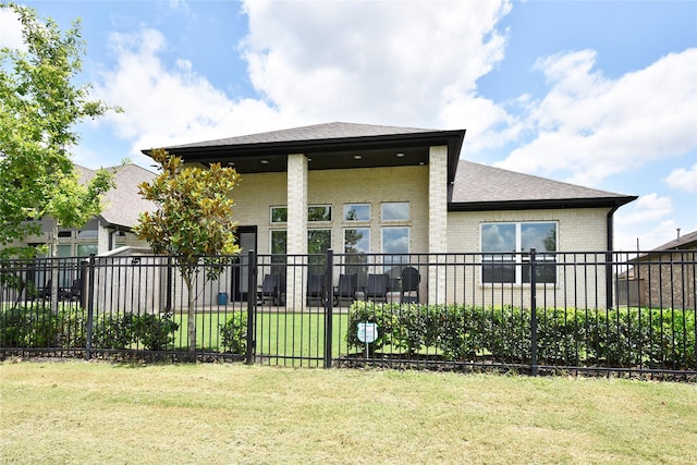 22911 Pearl Glen Dr, Richmond, TX 77469 - rear view of house featuring brick siding and a shingled roof