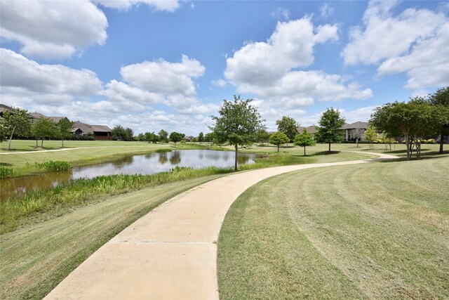 22911 Pearl Glen Dr, Richmond, TX 77469 - view of home's community featuring a water view and a lawn