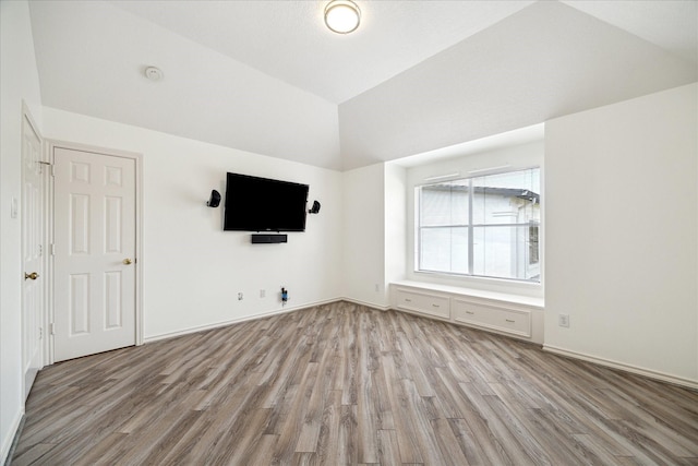4111 Thistle Hill Ct, Sugar Land, TX 77479 - unfurnished living room featuring light wood-style flooring and high vaulted ceiling