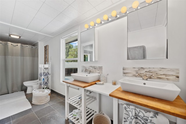 480 Johnson Rd, Coldspring, TX 77331 - full bath with a sink, toilet, a bidet, and a shower with curtain
