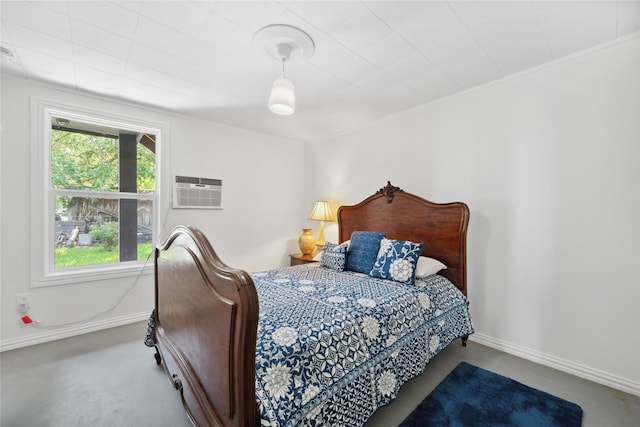 480 Johnson Rd, Coldspring, TX 77331 - bedroom with an AC wall unit and baseboards