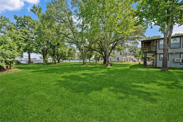 480 Johnson Rd, Coldspring, TX 77331 - view of green lawn featuring cooling unit