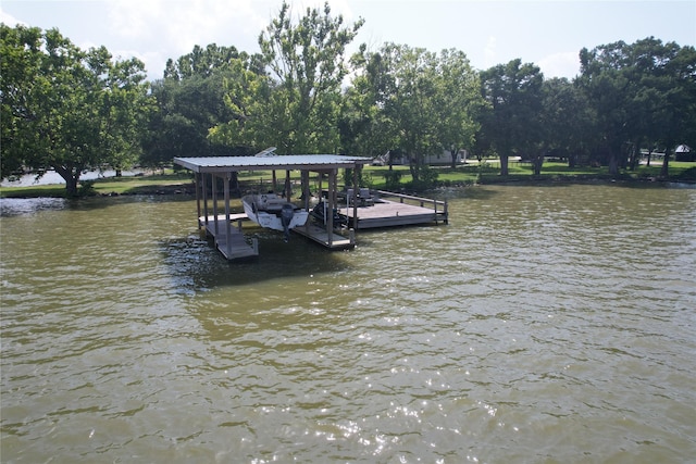 480 Johnson Rd, Coldspring, TX 77331 - dock area featuring a water view and boat lift
