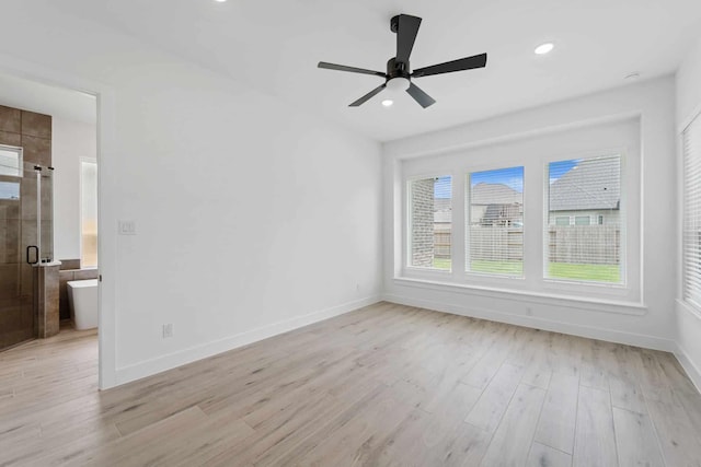 12834 Forest Garden Ct, Conroe, TX 77302 - unfurnished room featuring light wood finished floors, baseboards, ceiling fan, and recessed lighting