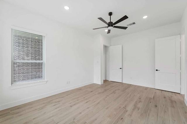 12834 Forest Garden Ct, Conroe, TX 77302 - unfurnished bedroom with light wood-style flooring, baseboards, recessed lighting, and a ceiling fan