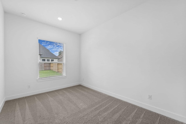 12834 Forest Garden Ct, Conroe, TX 77302 - unfurnished room featuring carpet floors, baseboards, and recessed lighting