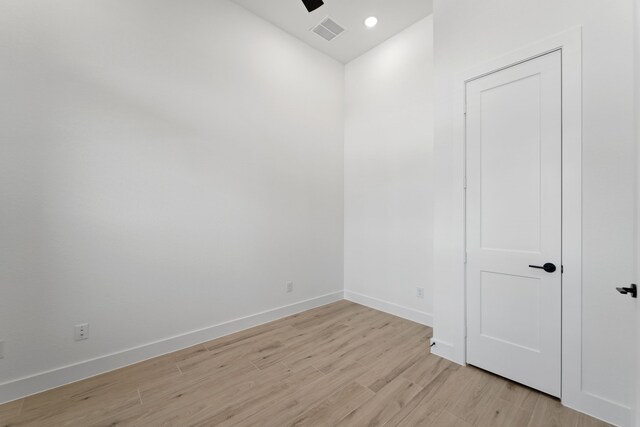 12834 Forest Garden Ct, Conroe, TX 77302 - unfurnished room with light wood-style floors, baseboards, and ceiling fan