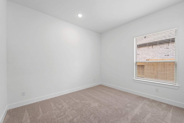 12834 Forest Garden Ct, Conroe, TX 77302 - empty room featuring carpet flooring, baseboards, and recessed lighting