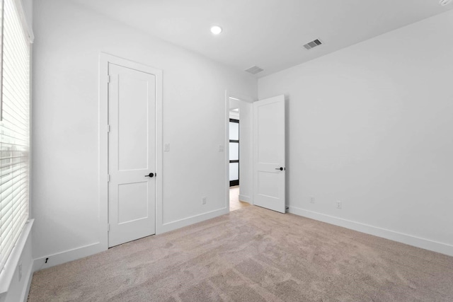 12834 Forest Garden Ct, Conroe, TX 77302 - unfurnished bedroom with carpet, baseboards, and recessed lighting