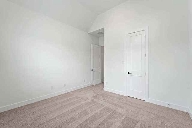 12834 Forest Garden Ct, Conroe, TX 77302 - unfurnished bedroom featuring carpet flooring, baseboards, and lofted ceiling